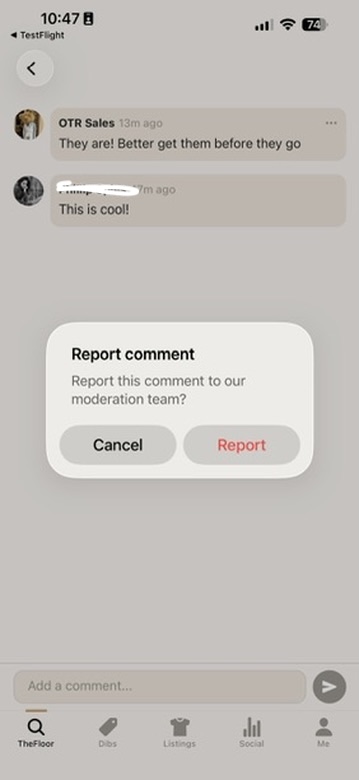 Tapping the report control on a comment opens a confirm dialog